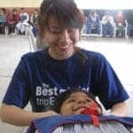 Dr Jenny treating a young Peruvian girl's neck