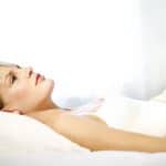 woman lying on the bed thinking